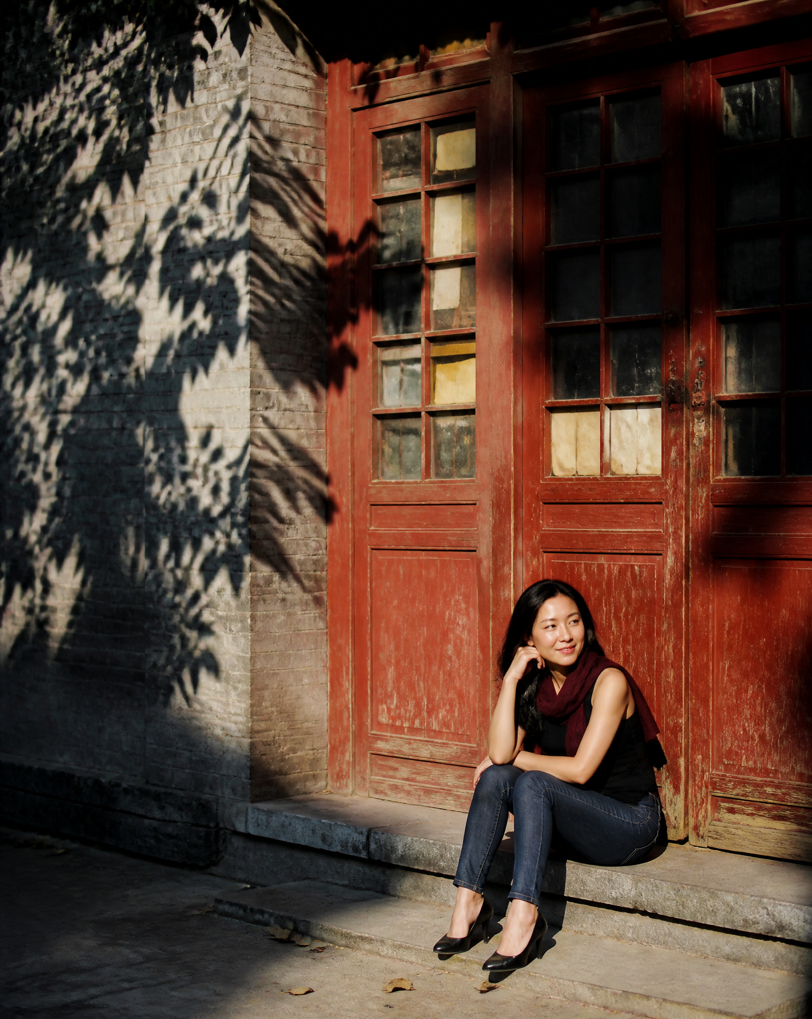 Create a realistic vertical 4:5 candid street portrait si...