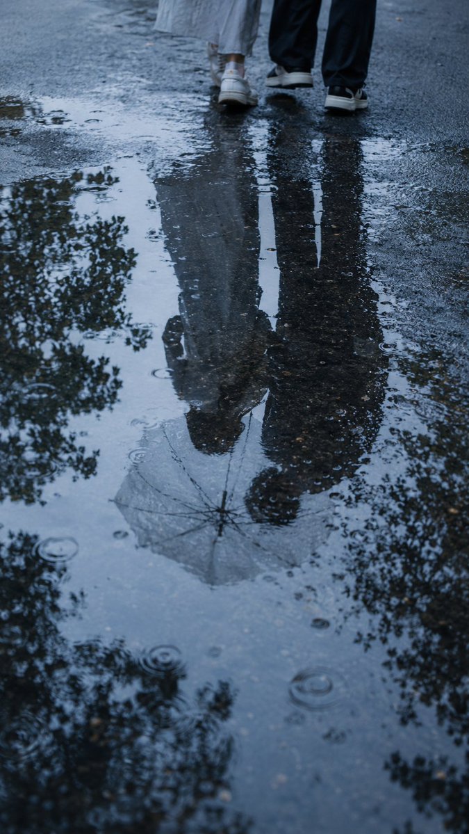 Reflected Romance: A Rainy Puddle Visual Narrative