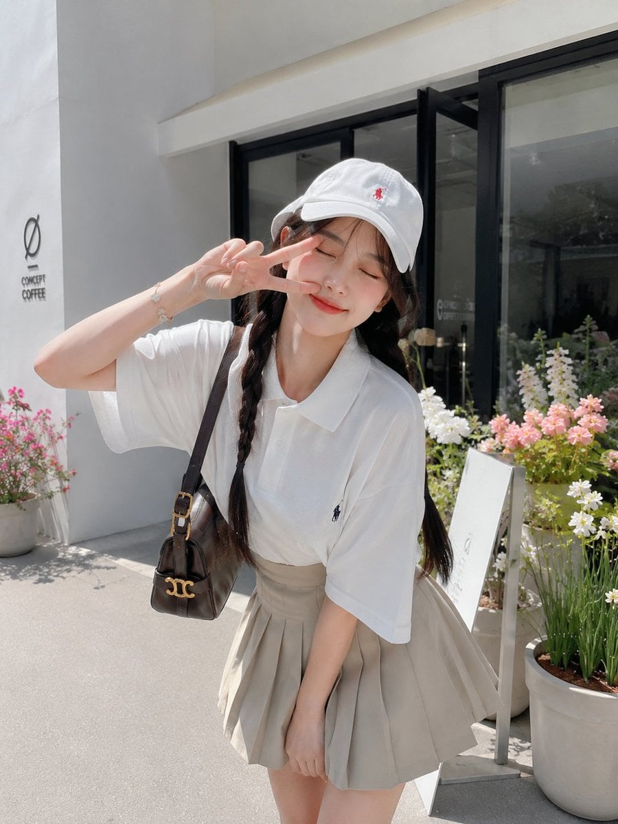 Playful Young Japanese Woman at Modern Minimalist Café - alternate