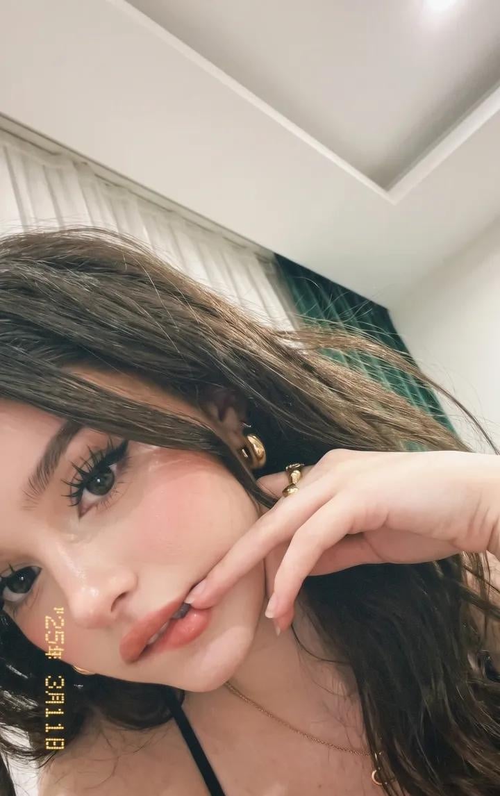 Candid Indoor Selfie with Vintage Aesthetic - alternate