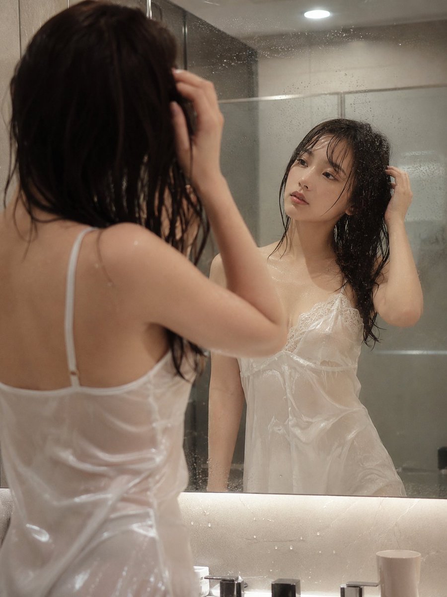 Morning Reflection in Steamy Bathroom