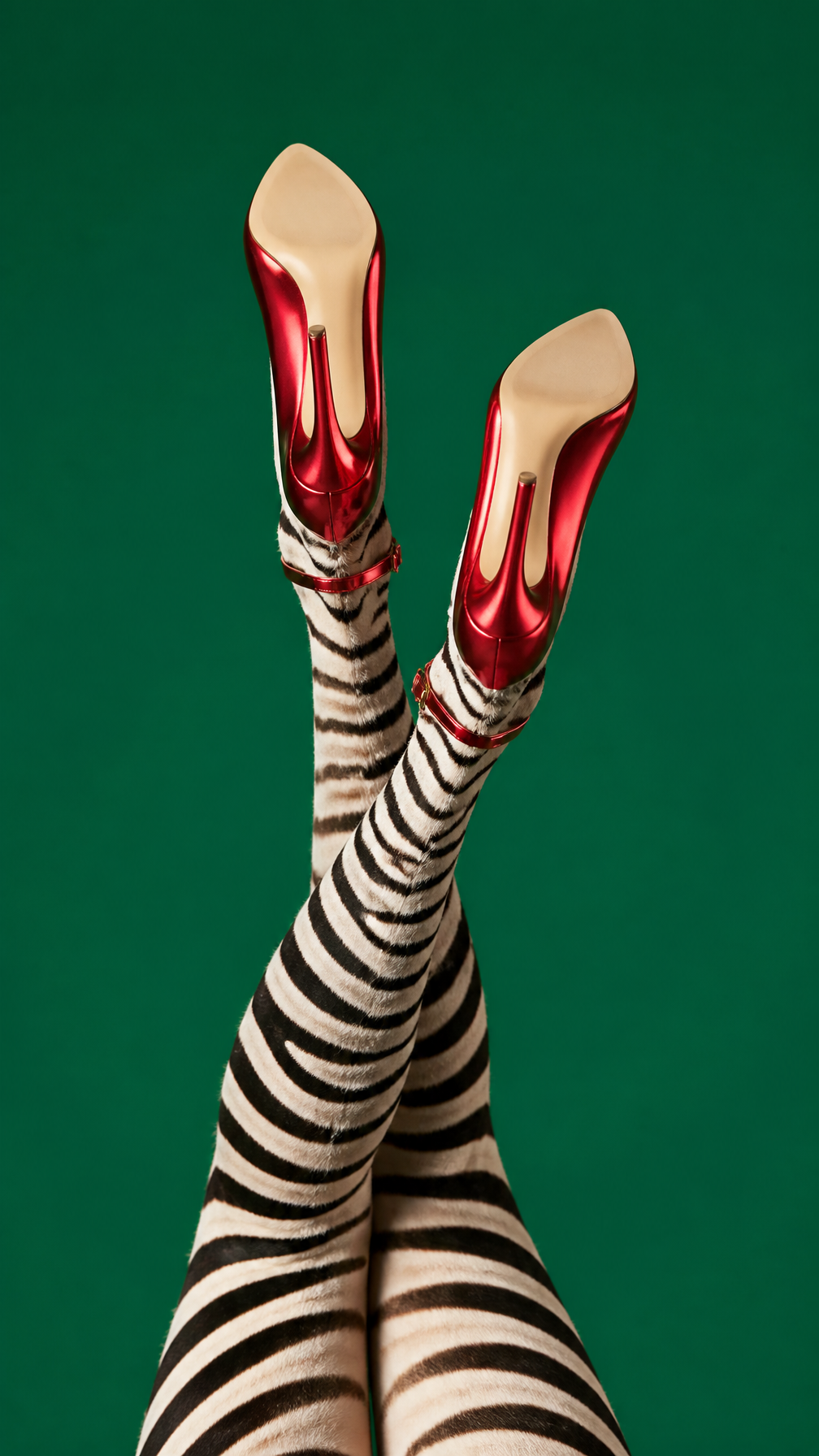 Zebra Legs in Metallic Red Stilettos